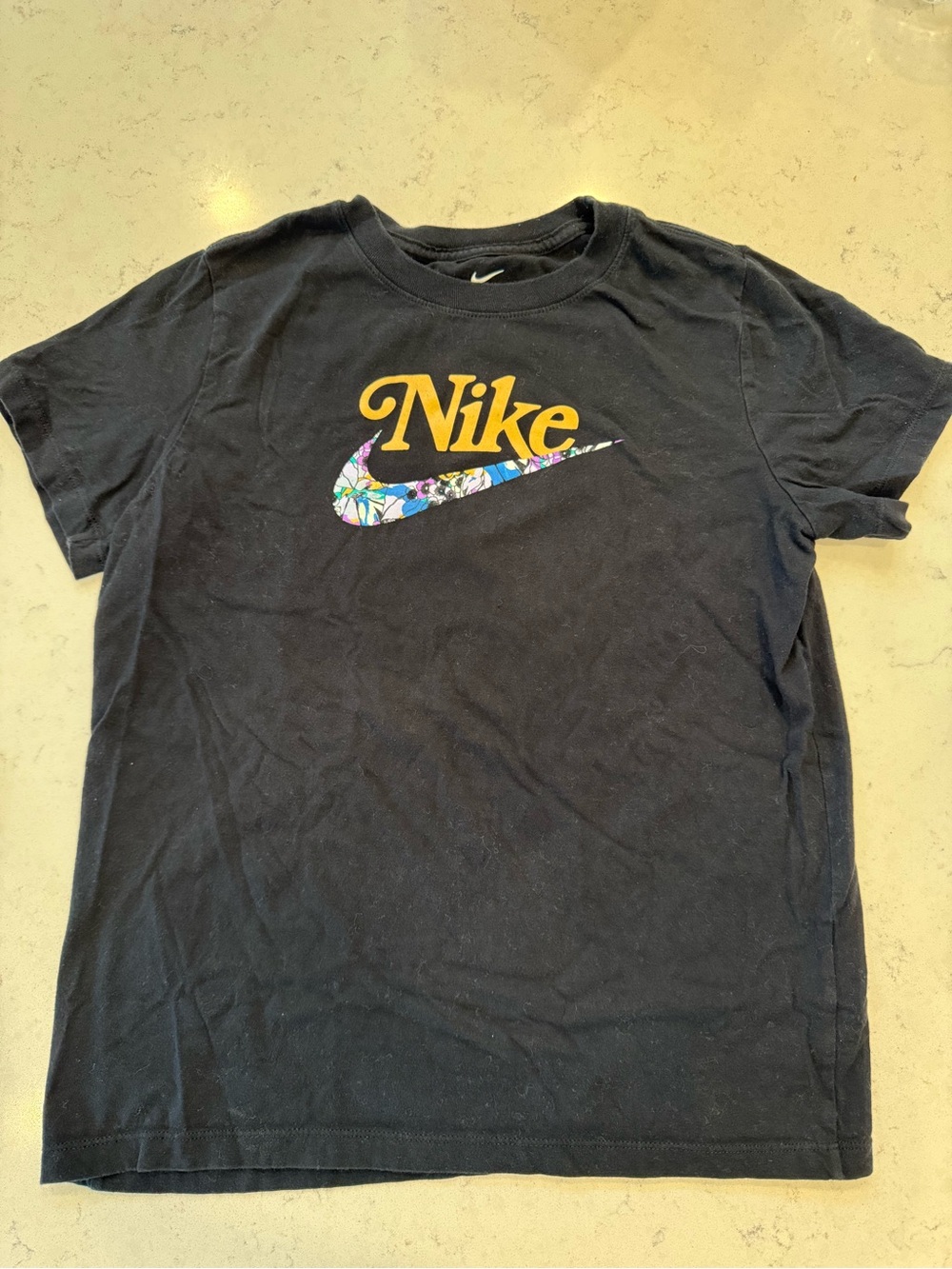 Nike Black T-Shirt with Gold Logo and Floral Swoosh